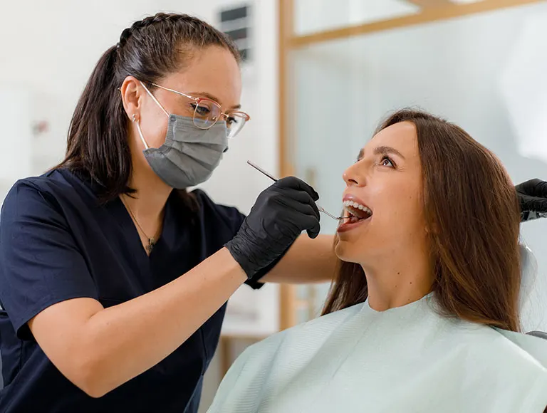 Smiling woman at dental office